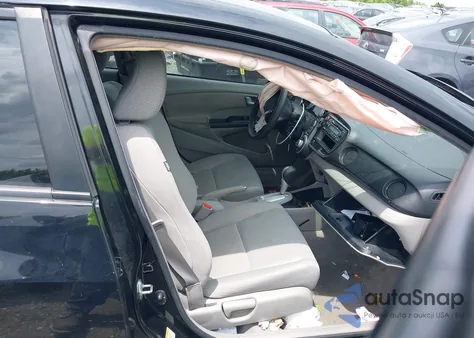 2012 Honda Insight from USA, damaged, VIN JHMZE2H36CS000448